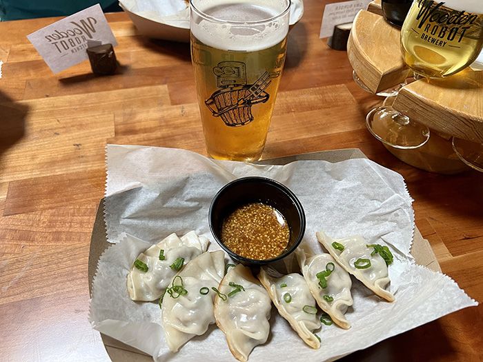 wooden robot brat dumplings