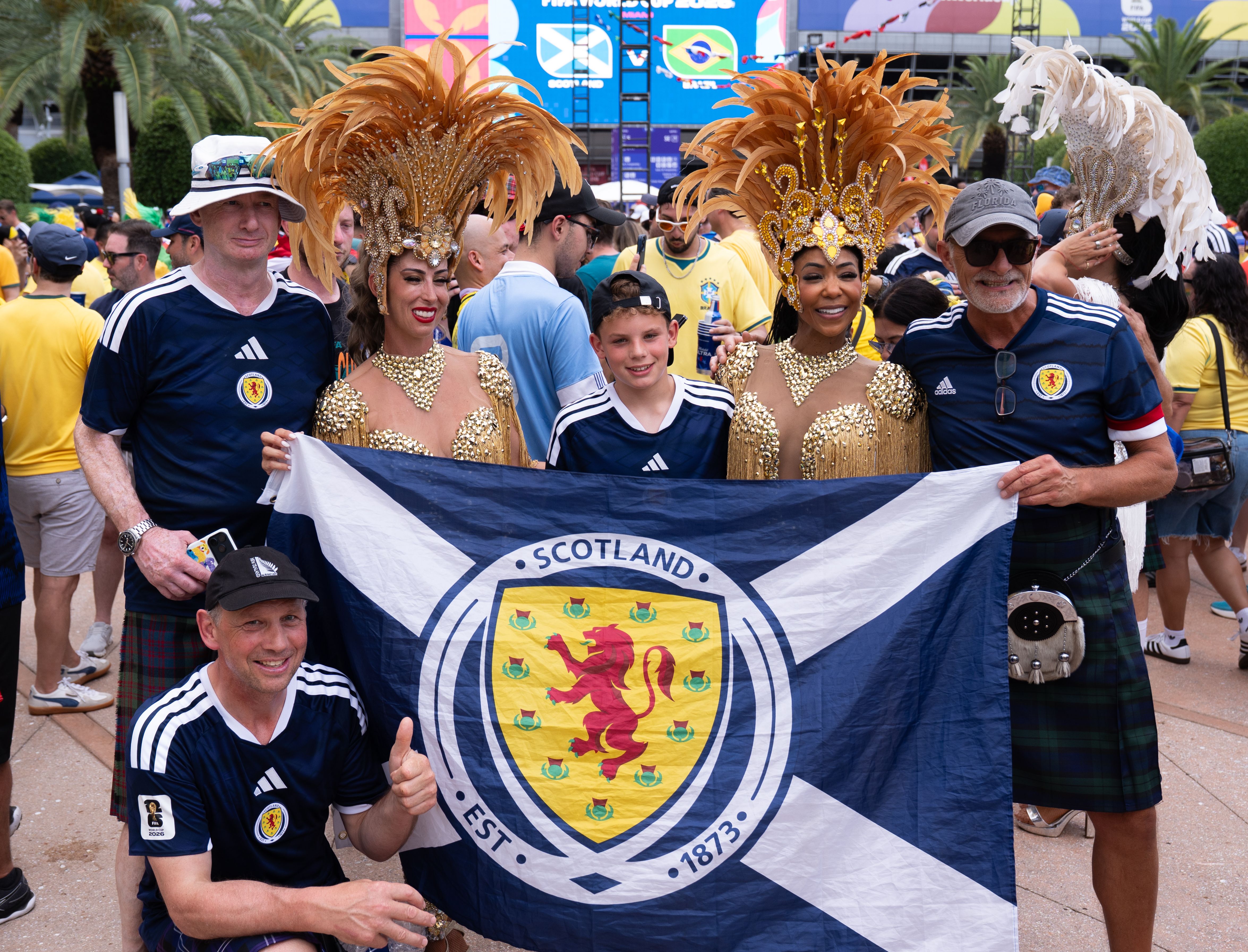 Brazil and Scotland supporters arrive at Hard Rock Stadium ahead of their FIFA World Cup 2026 Group C match in Miami, Florida, United States on June 24, 2026. Fans from both nations created a festive atmosphere outside the venue, dancing samba, singing together, and c