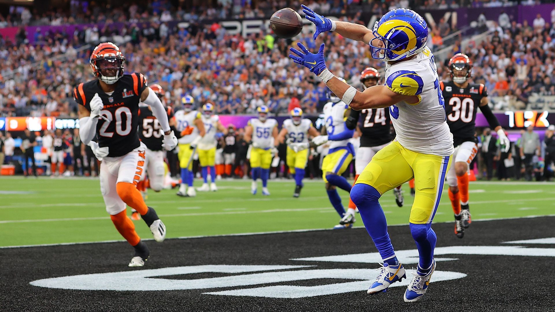 Cooper Kupp of the Los Angeles Rams makes a touchdown catch in front of Eli Apple (20) of the Cincinnati Bengals during Super Bowl LVI at SoFi Stadium on Feb. 13 in Inglewood, Calif.