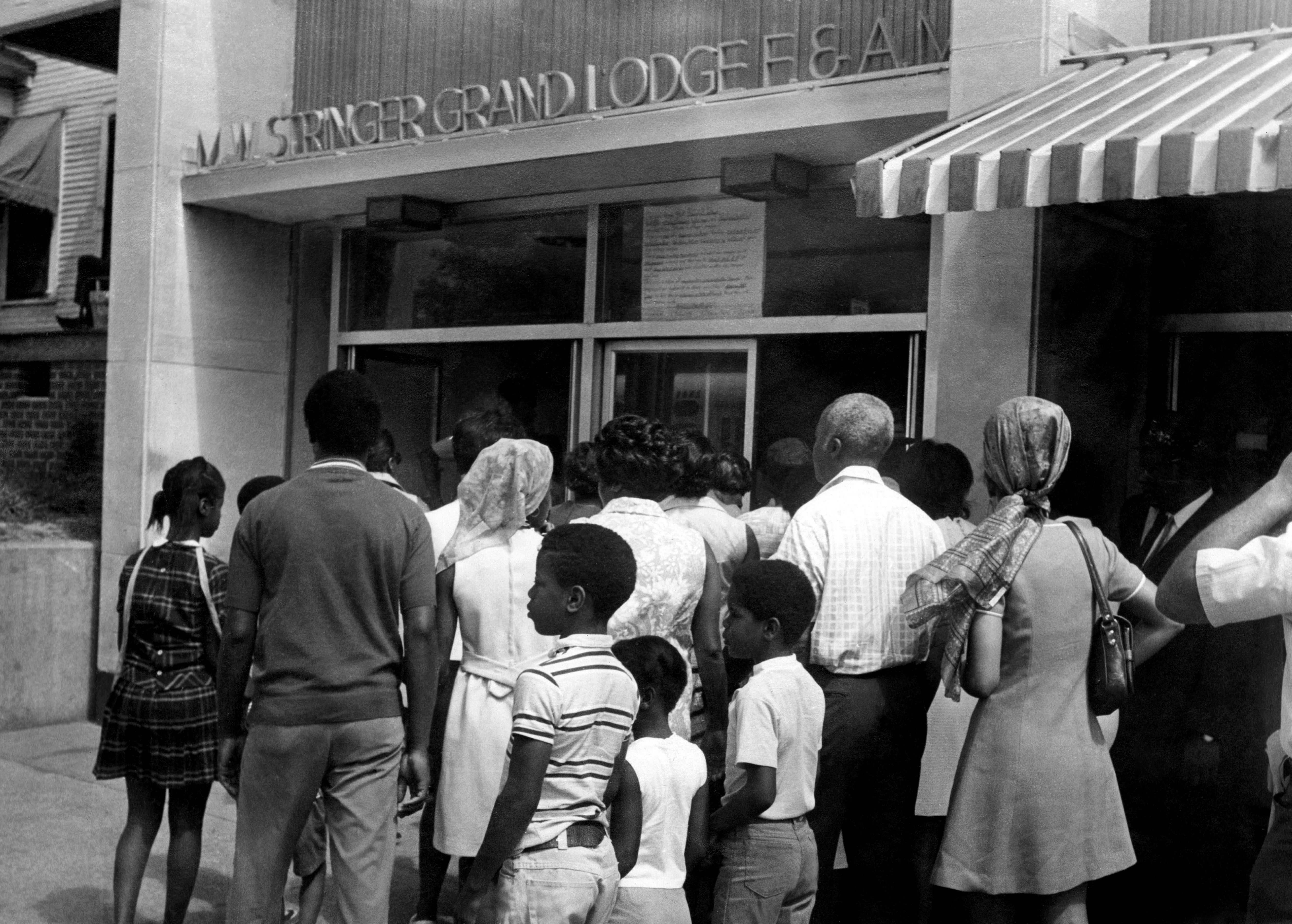 People visit M. W. Stringer Grand Lodge to view the last remains of James Earl Green, a high school senior, killed on May 15th 1970 by Mississippi Law Enforcement officers.