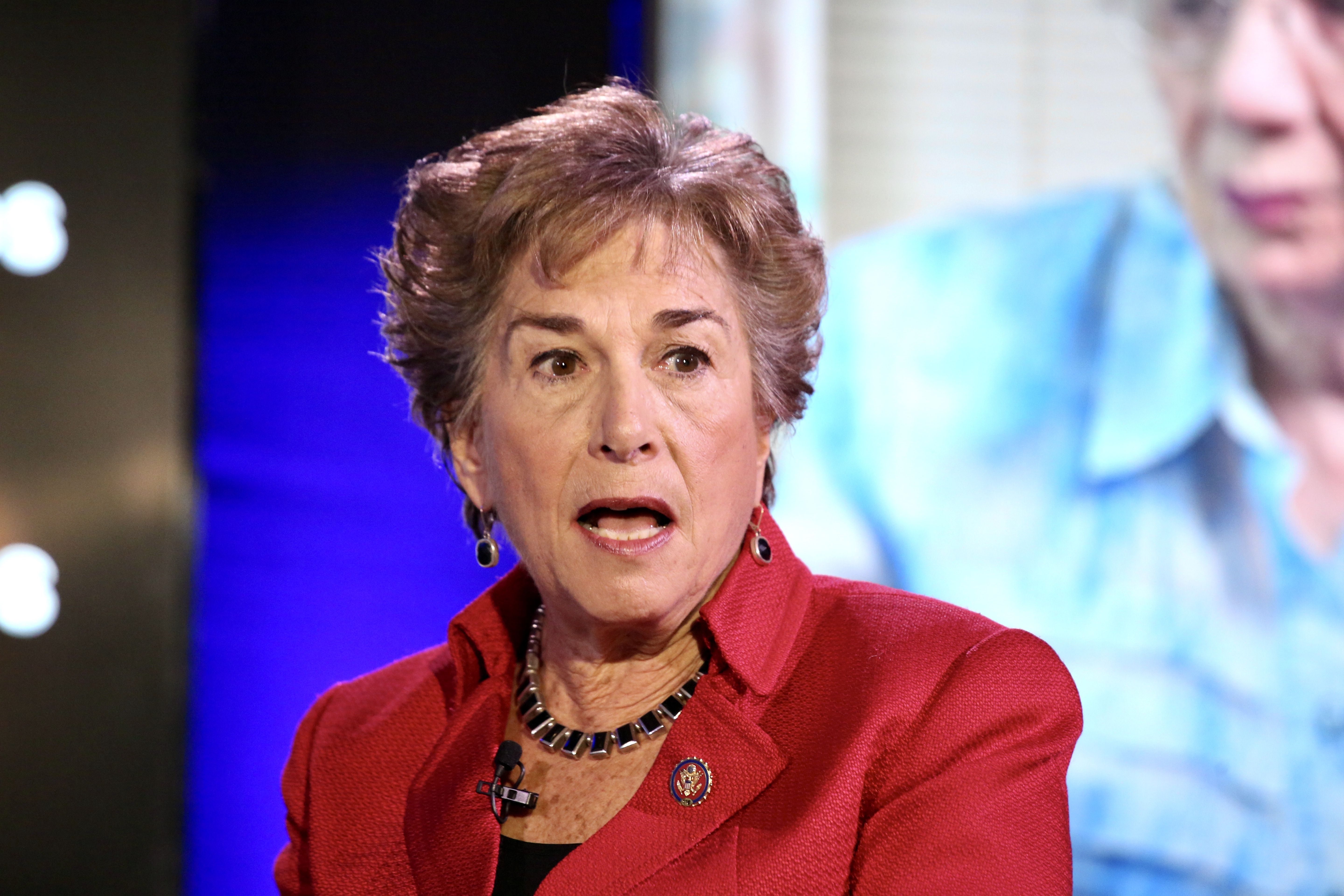 Rep. Jan Schakowsky speaks on the Axois stage. 
