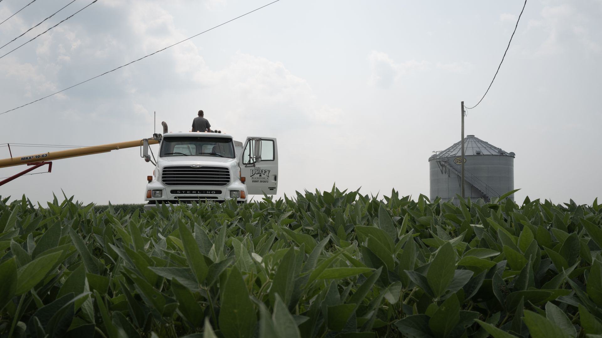 A farm field and farm truck