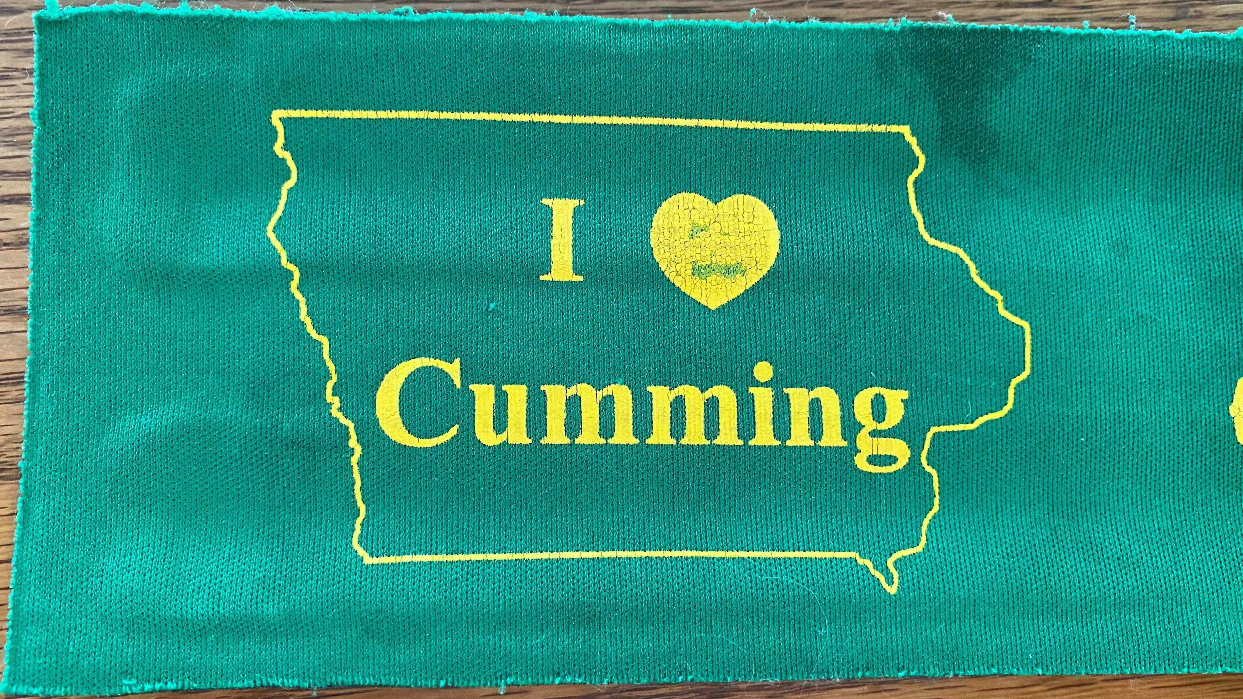 A koozie from Cumming Tap