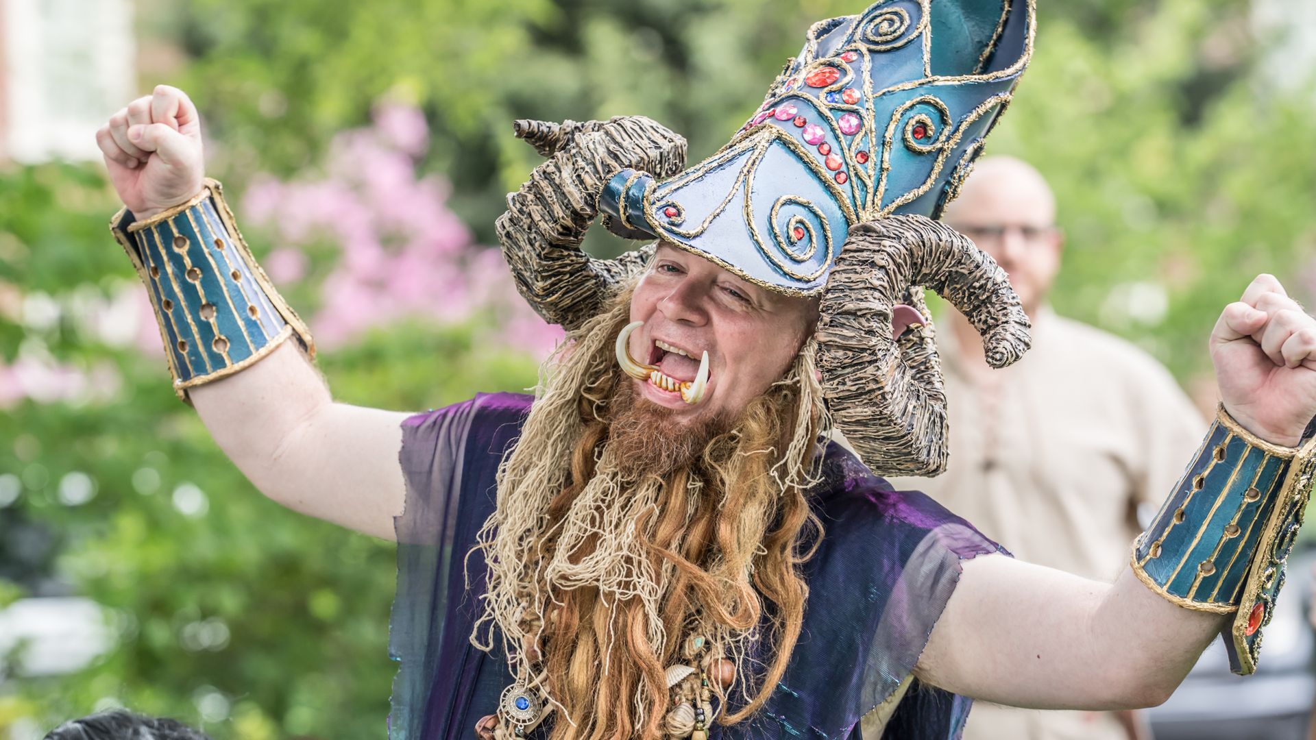 A man dresses as viking with masive teeth 