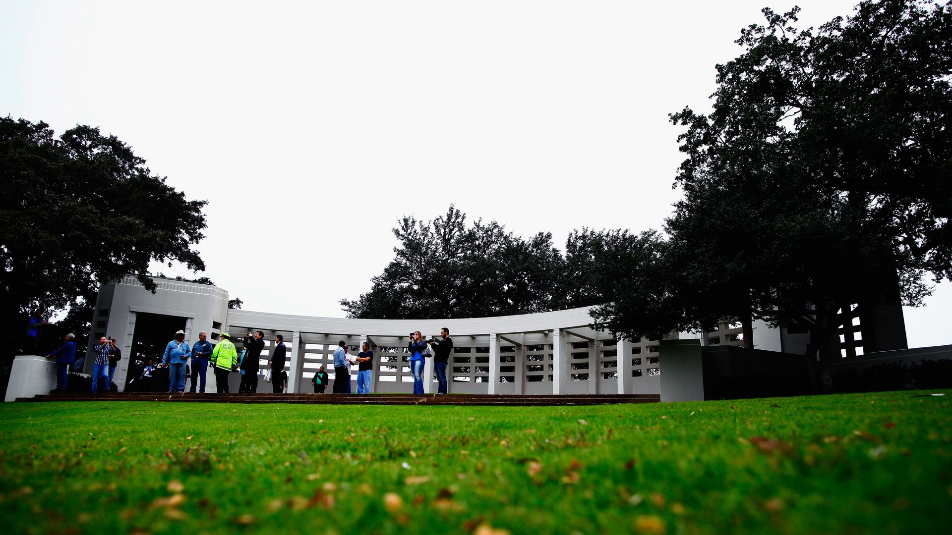 People on the grassy knoll