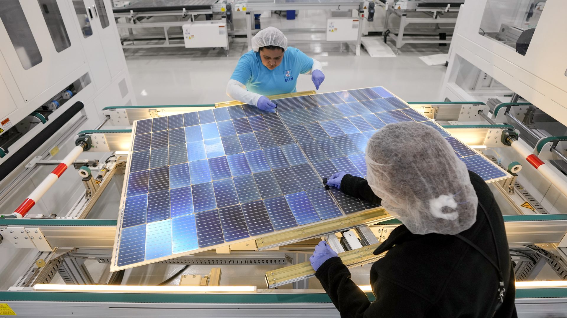 Workers at solar manufacturing plant