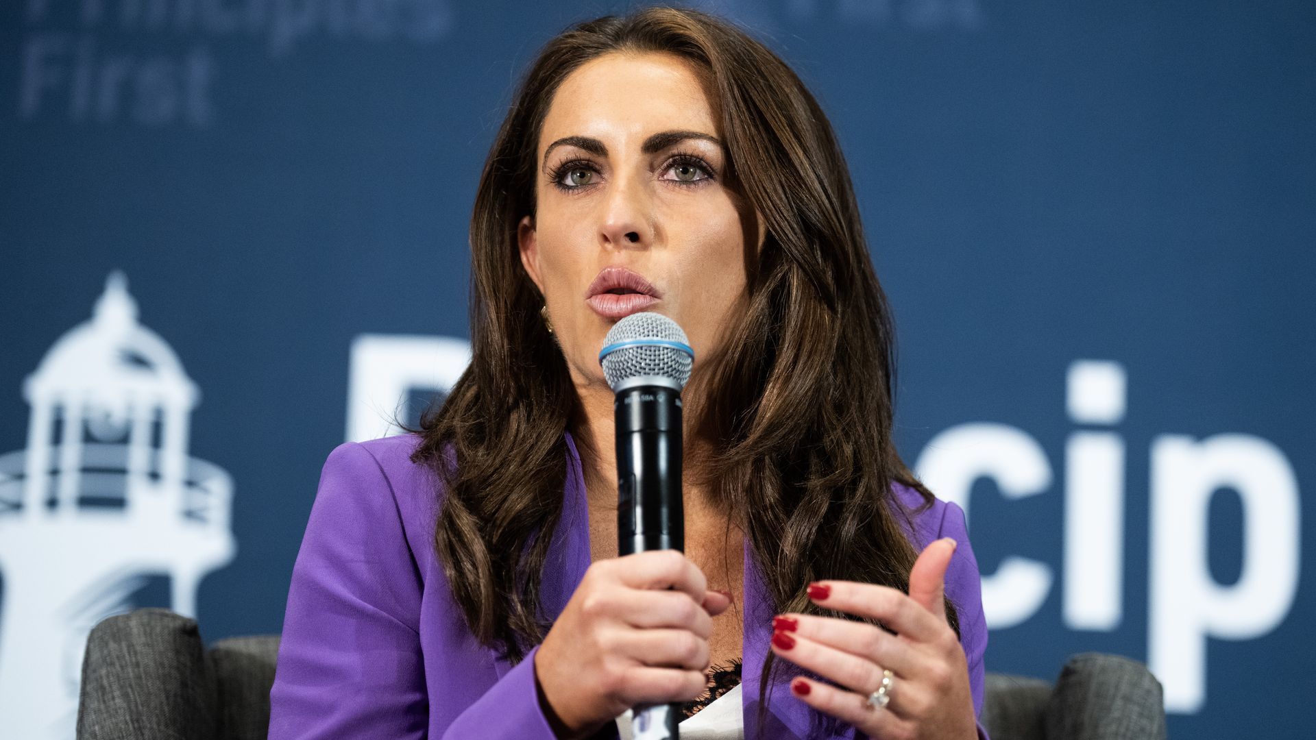 Alyssa Farah Griffin speaks on stage at the Principles First 2024 Summit in Washington.