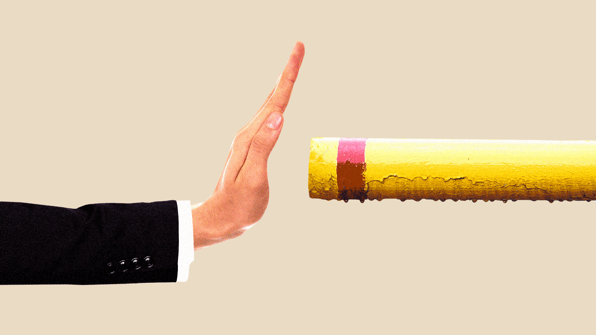 A hand blocking a gas nozzle then backing away