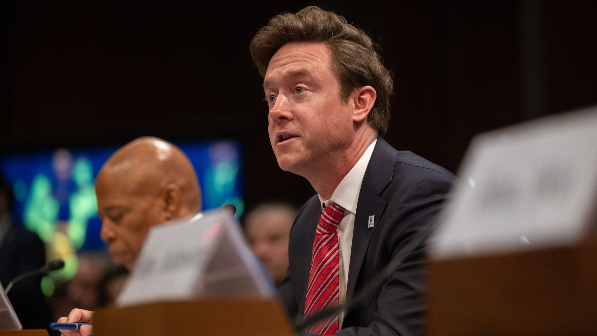 A man in a suit and tie.