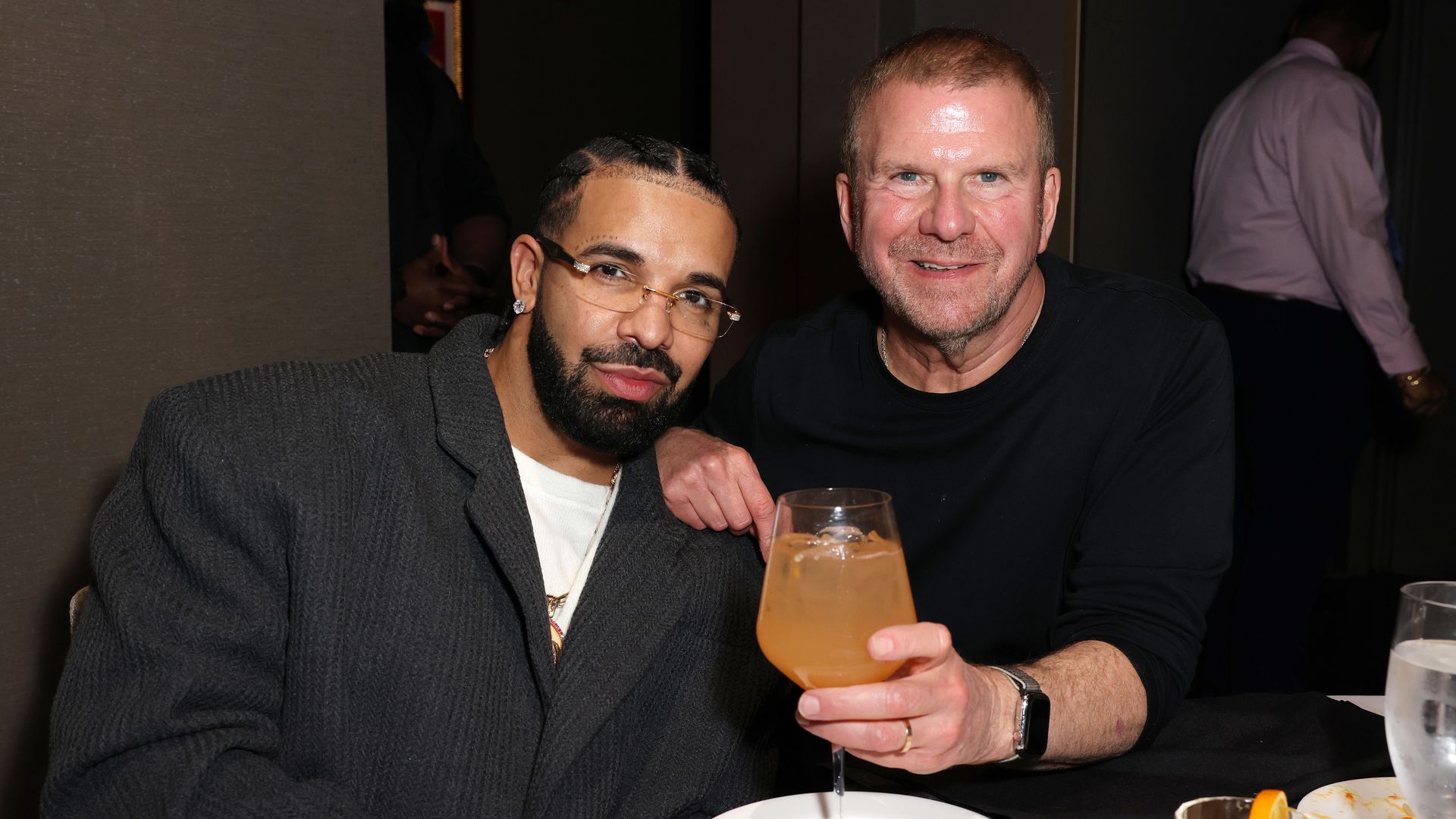Drake and Tilman Fertitta pose for a picture