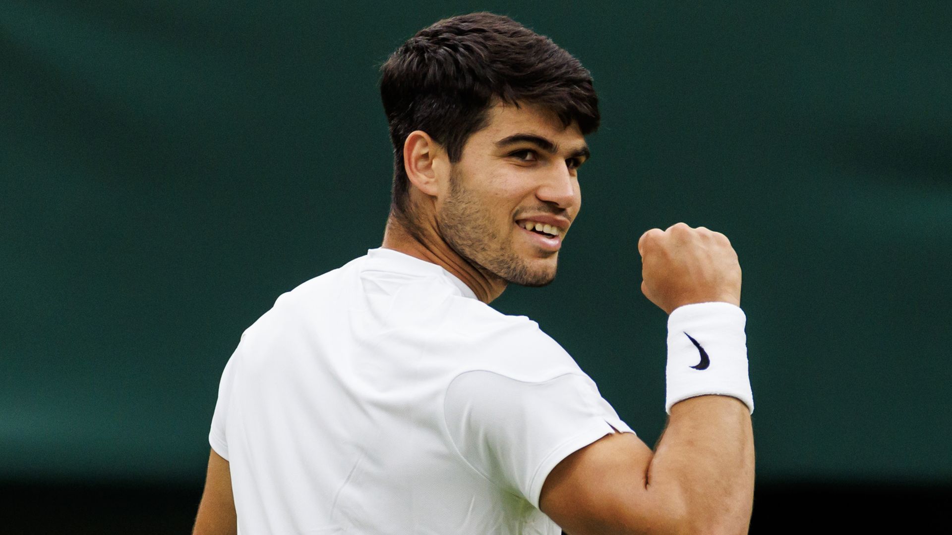 Carlos Alcaraz of Spain celebrates during his match against Ugo Umbert of France in the fourth round of the men's singles during day seven of The Championships Wimbledon 2024 at All England Lawn Tennis and Croquet Club on July 07, 2024 in London, England. (Photo by Frey/TPN/Getty Images)