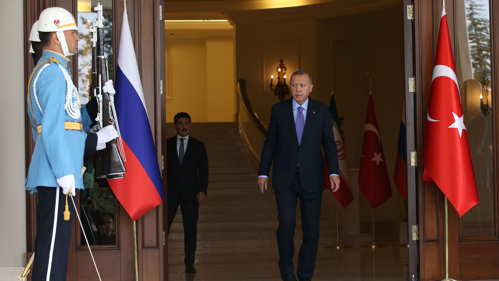 Erdoğan awaits the arrival of Vladimir Putin in Ankara, 2019. Photo: Mikhail Svetlov/Getty Images