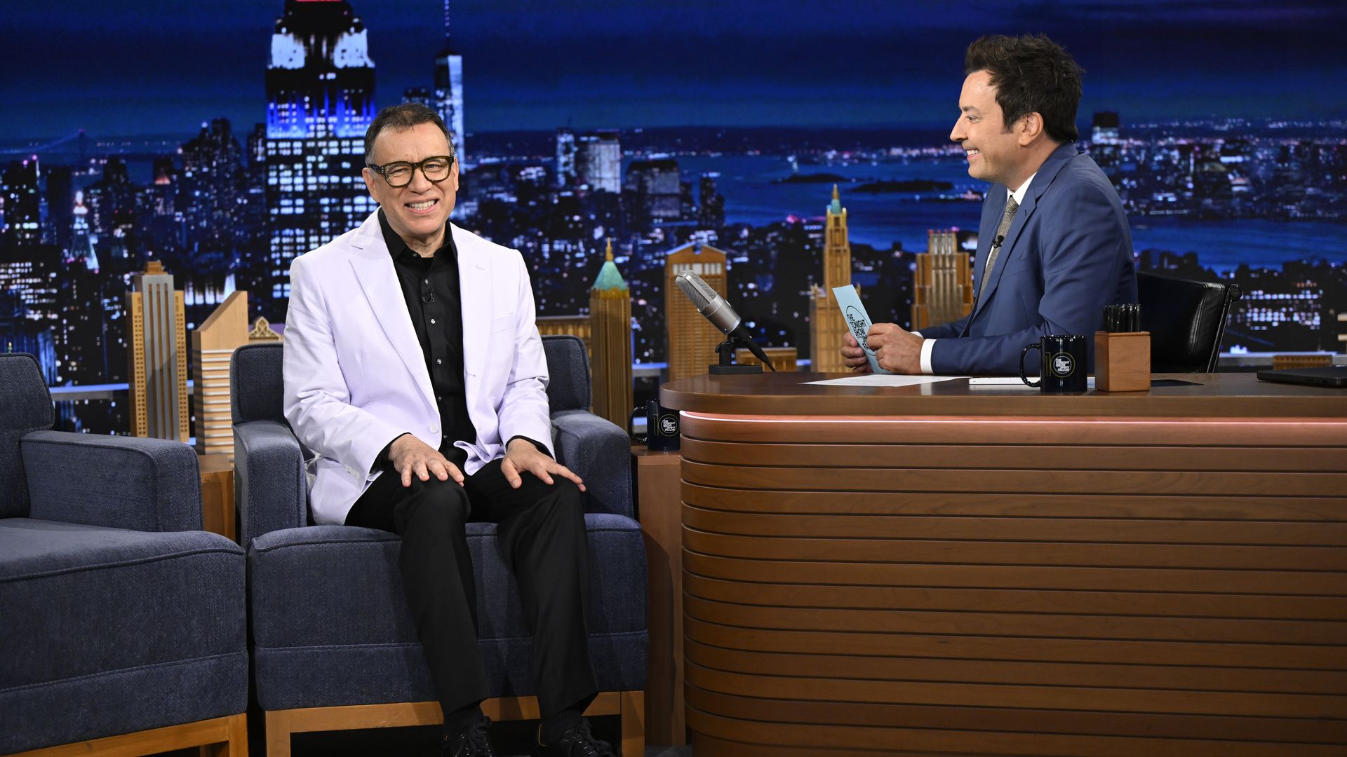 Actor & comedian Fred Armisen sits during an interview with Jimmy Fallon in Fallon's studio 