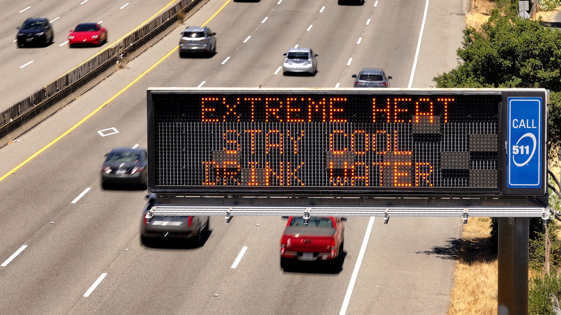  In an aerial view, a Caltrans changeable message sign on Highway 101 displays a warning about extreme heat on July 02, 2024 in Corte Madera, California. Much of California is experiencing an extended heat wave the will bring extreme temperatures to much of the state for the next week. 