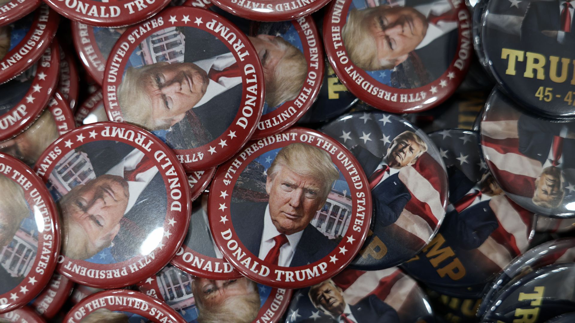 Pins displaying Trump's picture and name are presented in a Washington, D.C., gift shop.