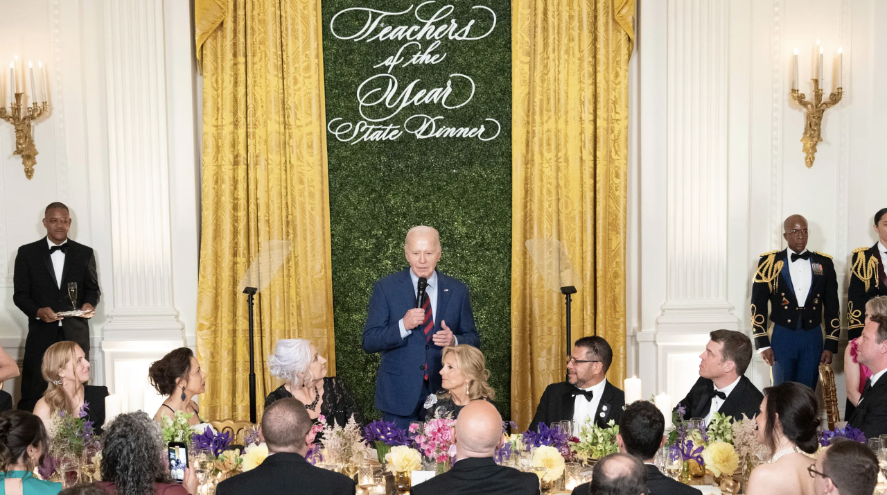 President Joe Biden speaks during the "Teachers of the Year" state dinner in the East Room of the White House on Thursday. 