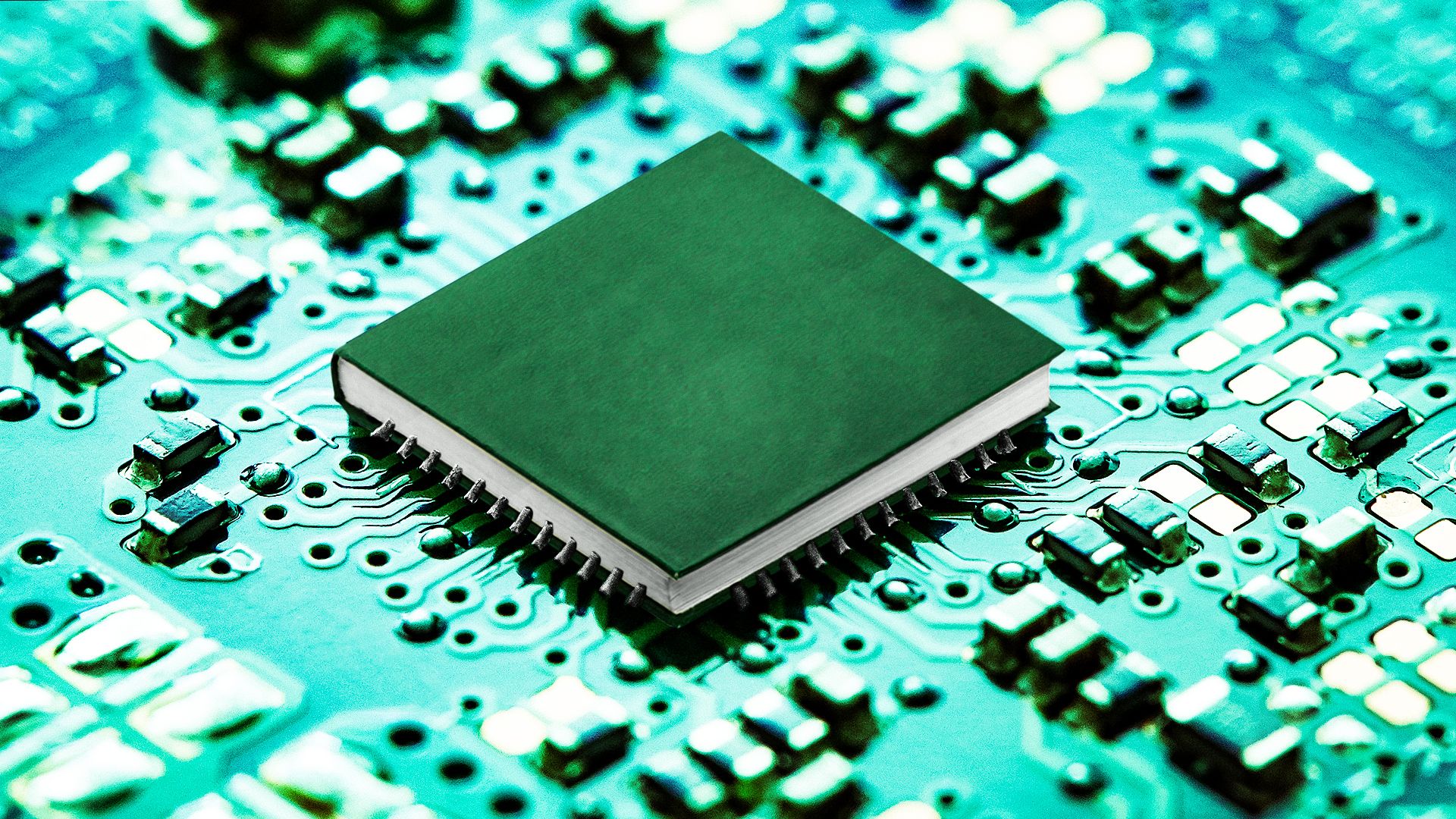 Illustration of a circuit board with a book stylized as the central chip. 