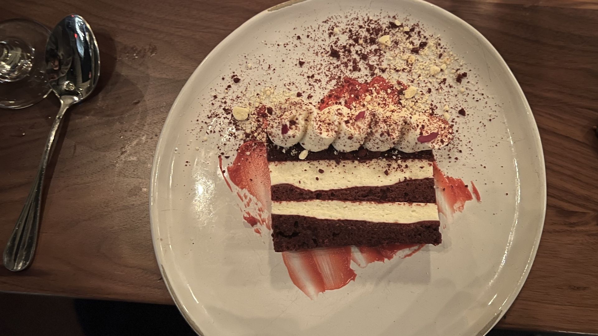 A piece of red velvet cake on a plate.