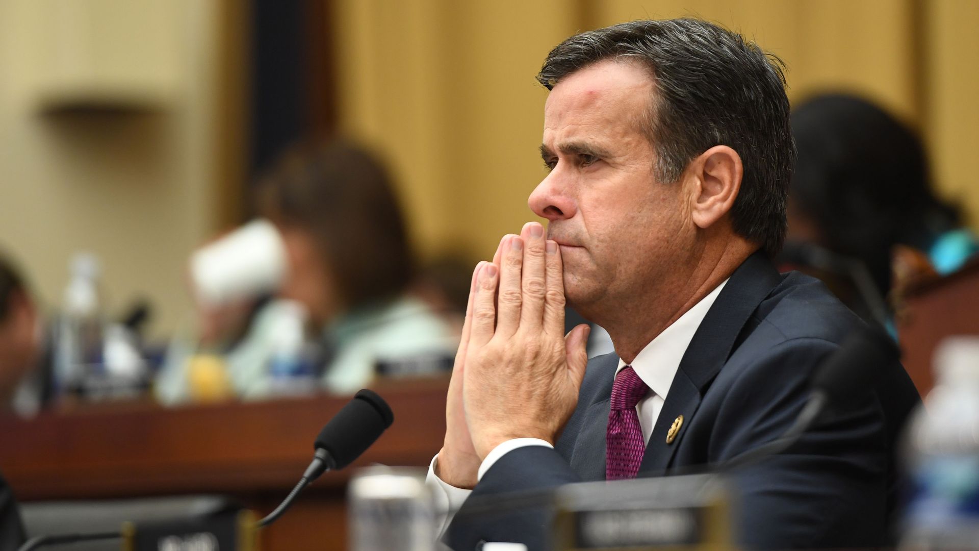 In this image, Ratcliff sits with his hands steepled and listens during a testimony.