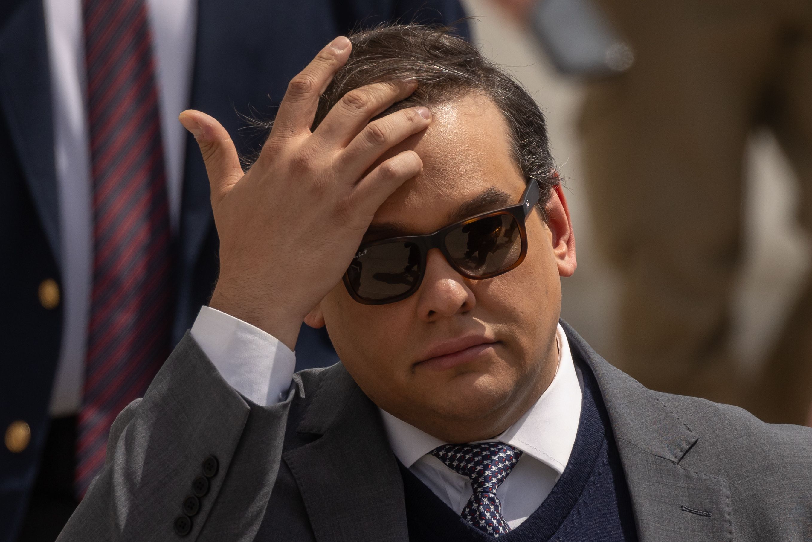 George Santos, former Representative from New York, exits federal court in Central Islip, New York, US, on Friday, April 25, 2025. Former US Representative George Santos, a onetime rising Republican star who falsely claimed to have worked for Goldman Sachs Group Inc. before running for Congress, was