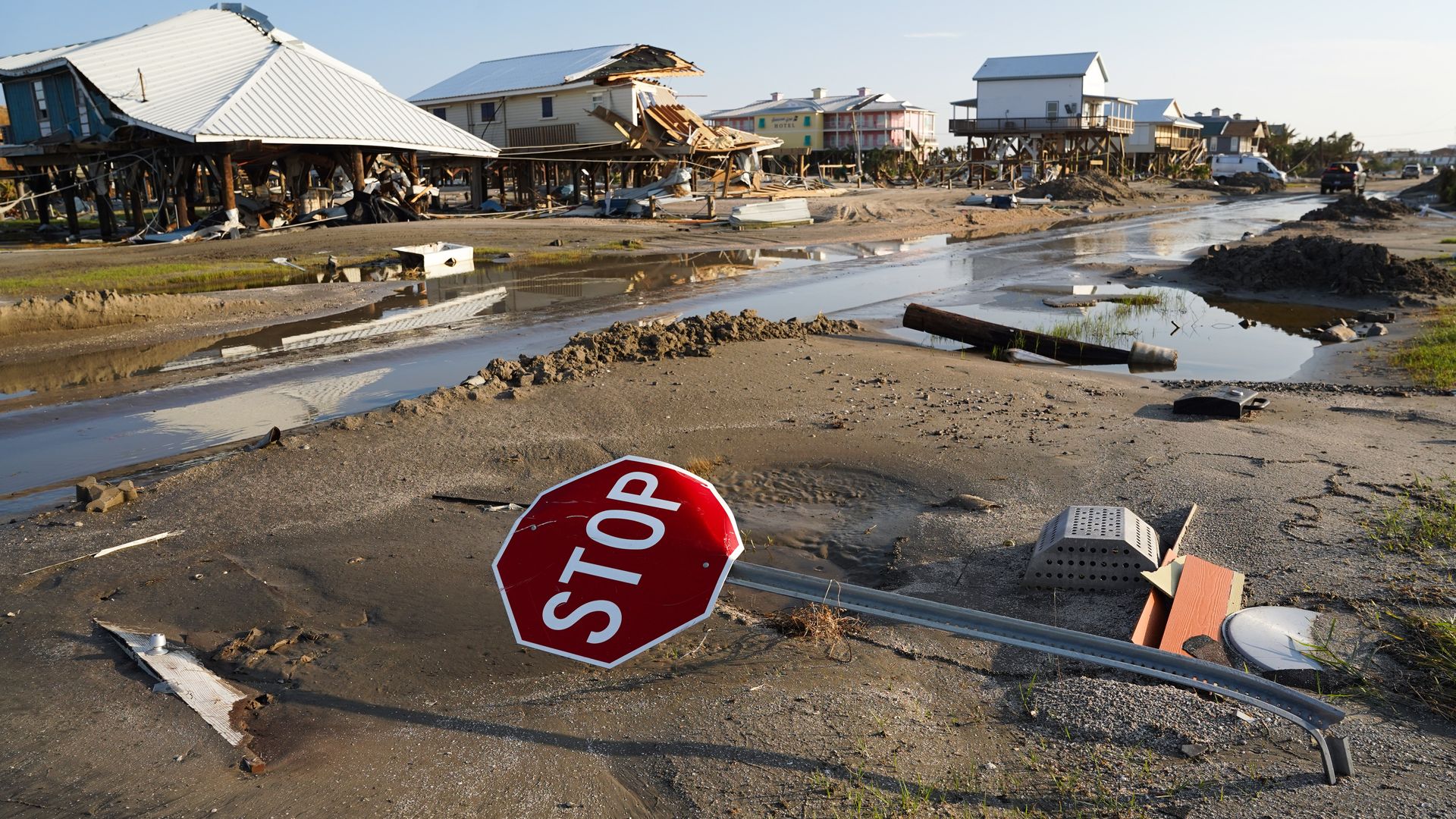 A bent stop sign in a storm damaged neighborhood after Hurricane Ida on September 4, 2021 in Grand Isle, Louisiana.