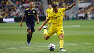 Columbus Crew player Lucas Zelerayan gears up for a kick.