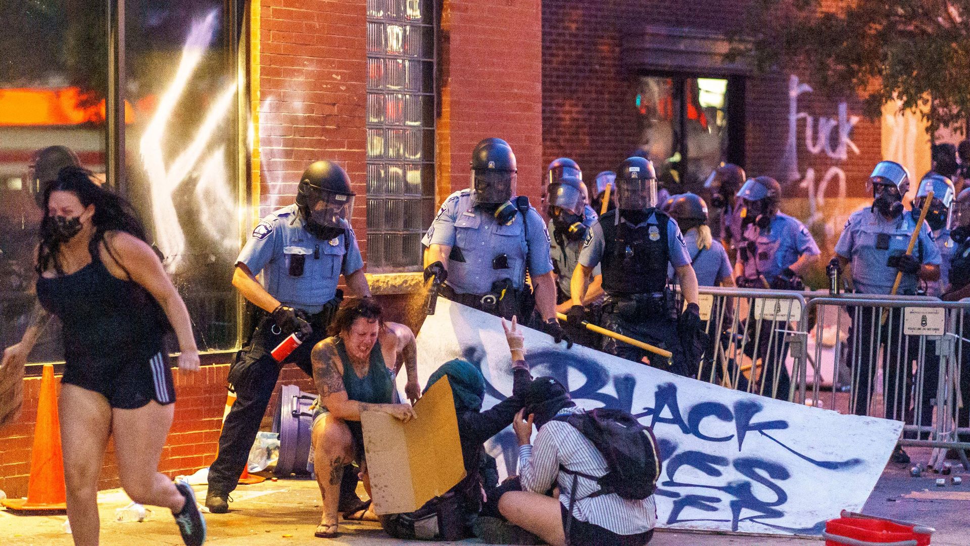 Officers pepper spray protestors