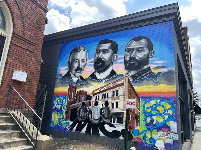 Abel Jackson’s “Historic Brooklyn” mural at 219 South Brevard St. Photo: Daniele Chemtob/Axios