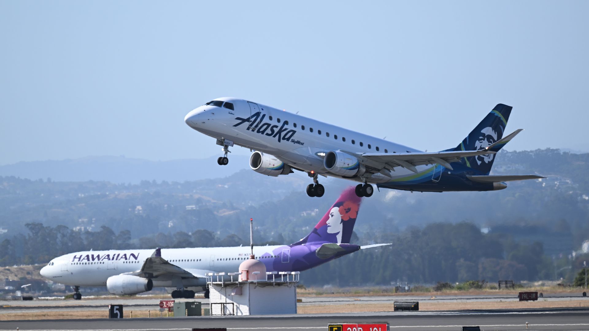 Alaska and Hawaiian Airlines planes