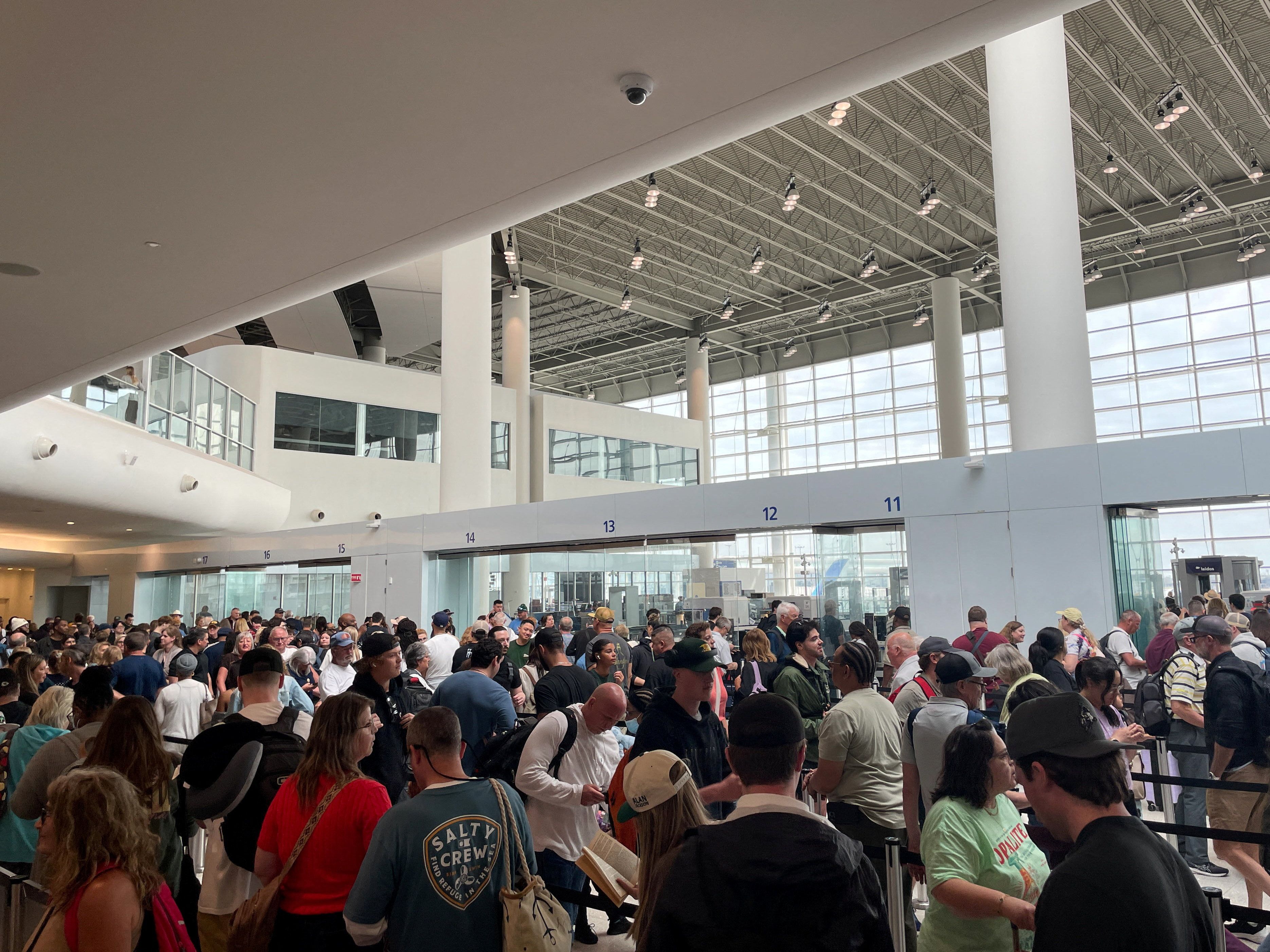 TSA lines crawl yesterday at Louis Armstrong New Orleans International Airport. 