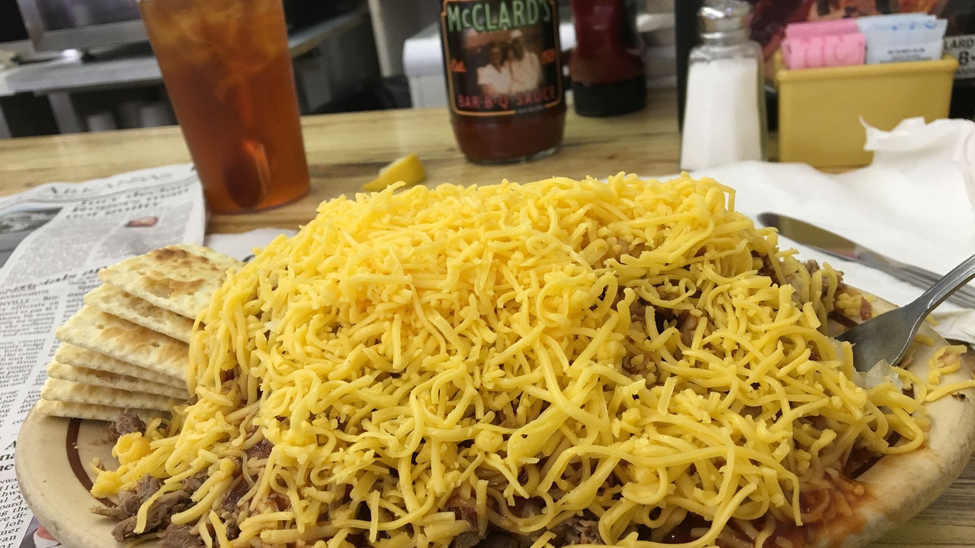 Photo of a plate of food covered in cheese