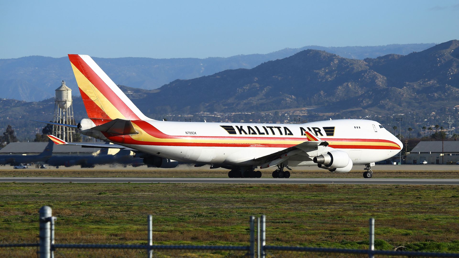 A charter plane lands at March Air Reserve Base in Riverside, California on January 29, 2020