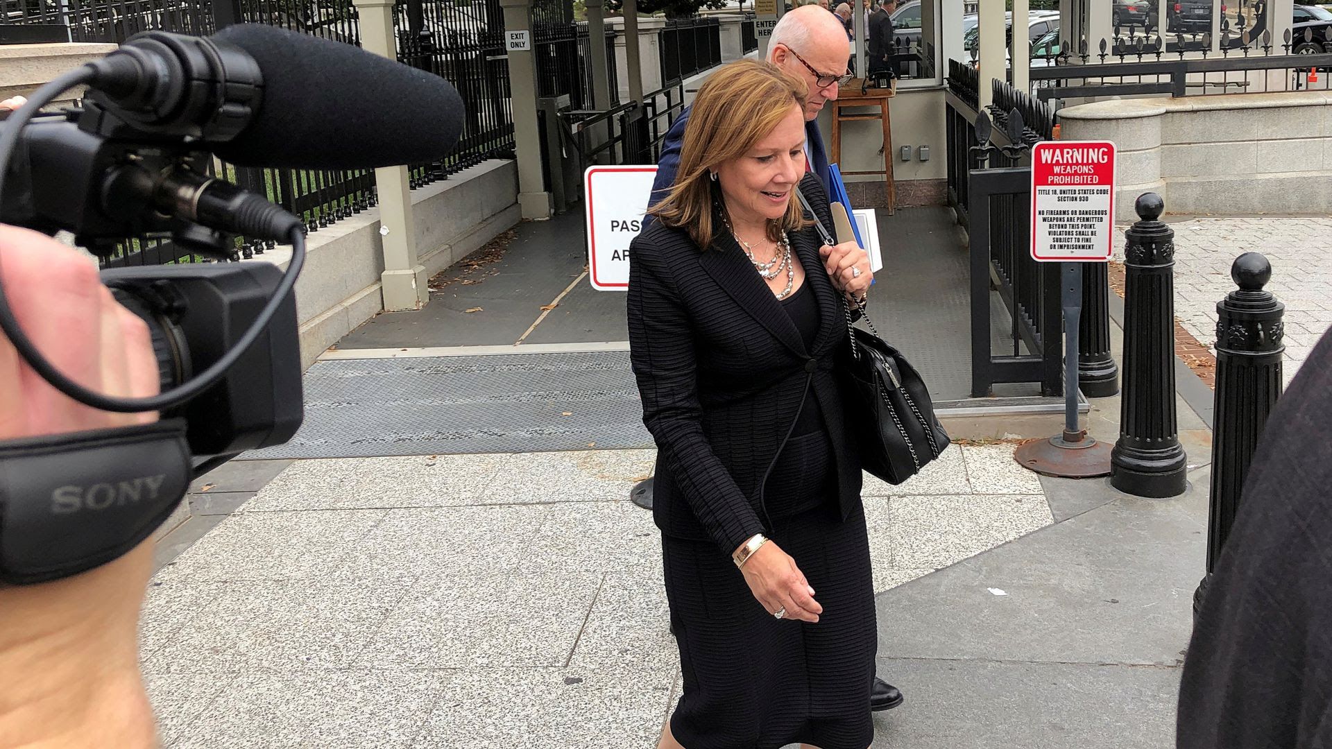 GM CEO Mary Barra departs the White House on Sept. 5