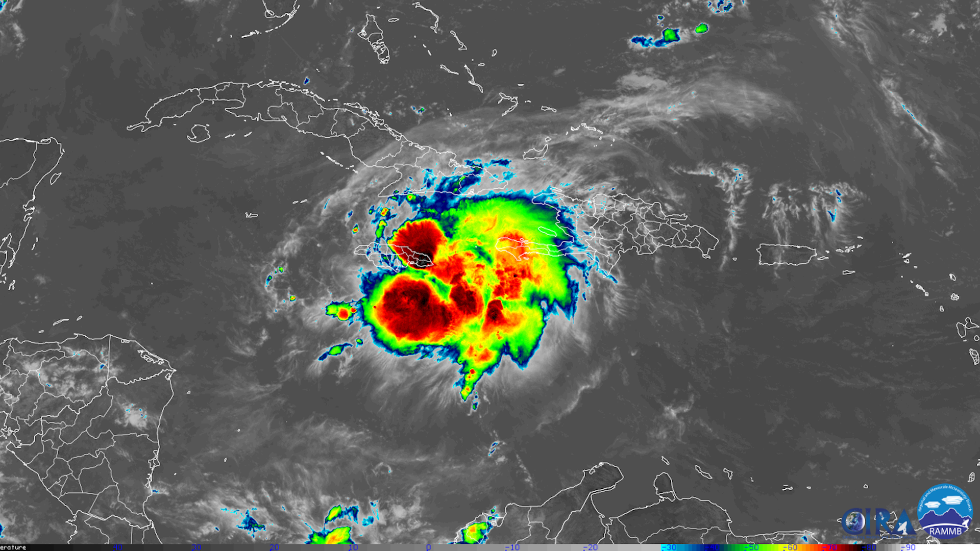 Image from a satellite showing red and orange colors from a tropical storm.