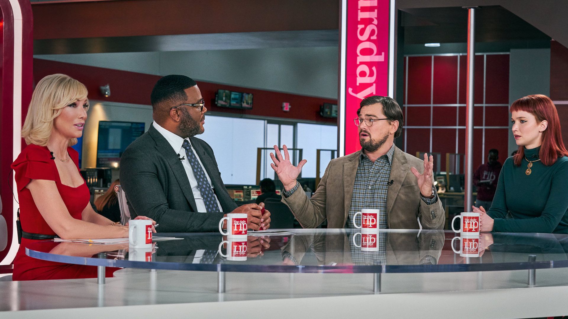 Tyler Perry, Leonardo DiCaprio and Jennifer Lawrence in a scene from "Don't Look Up."