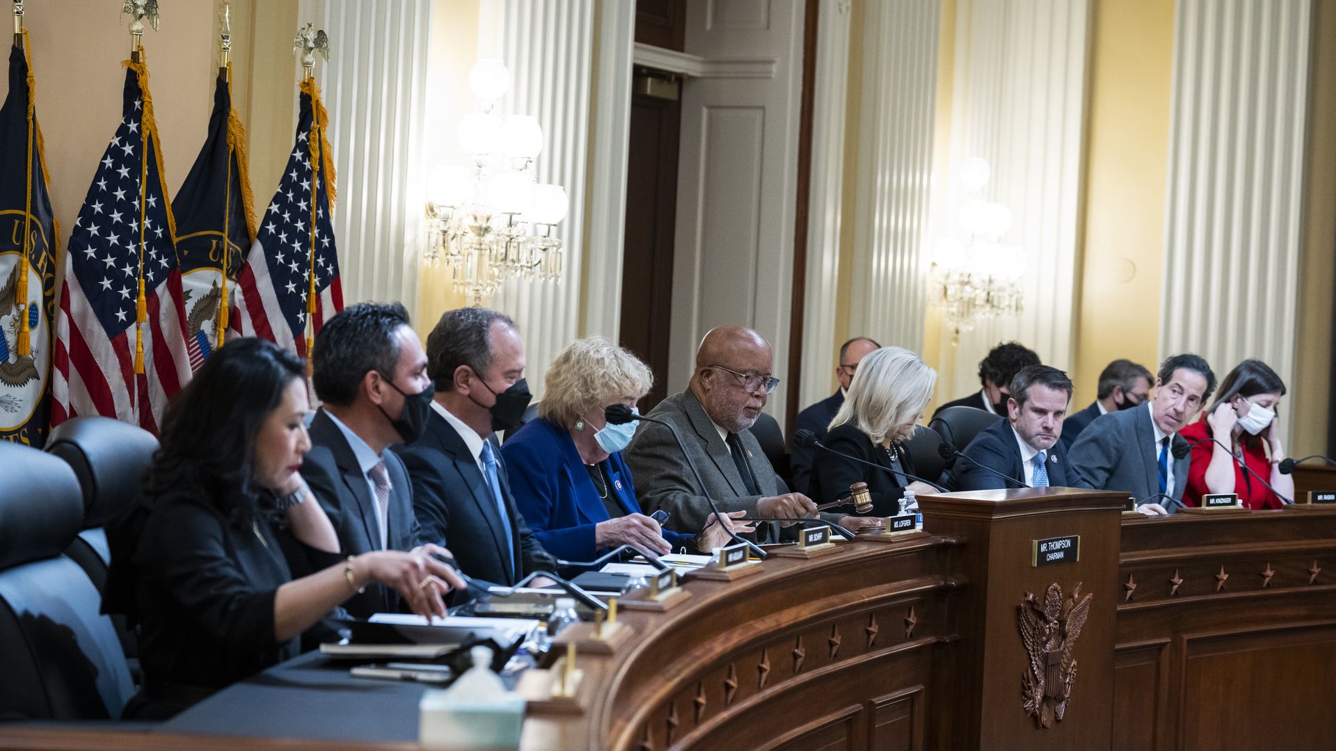 The January 6 Select Committee is seen during a meeting.