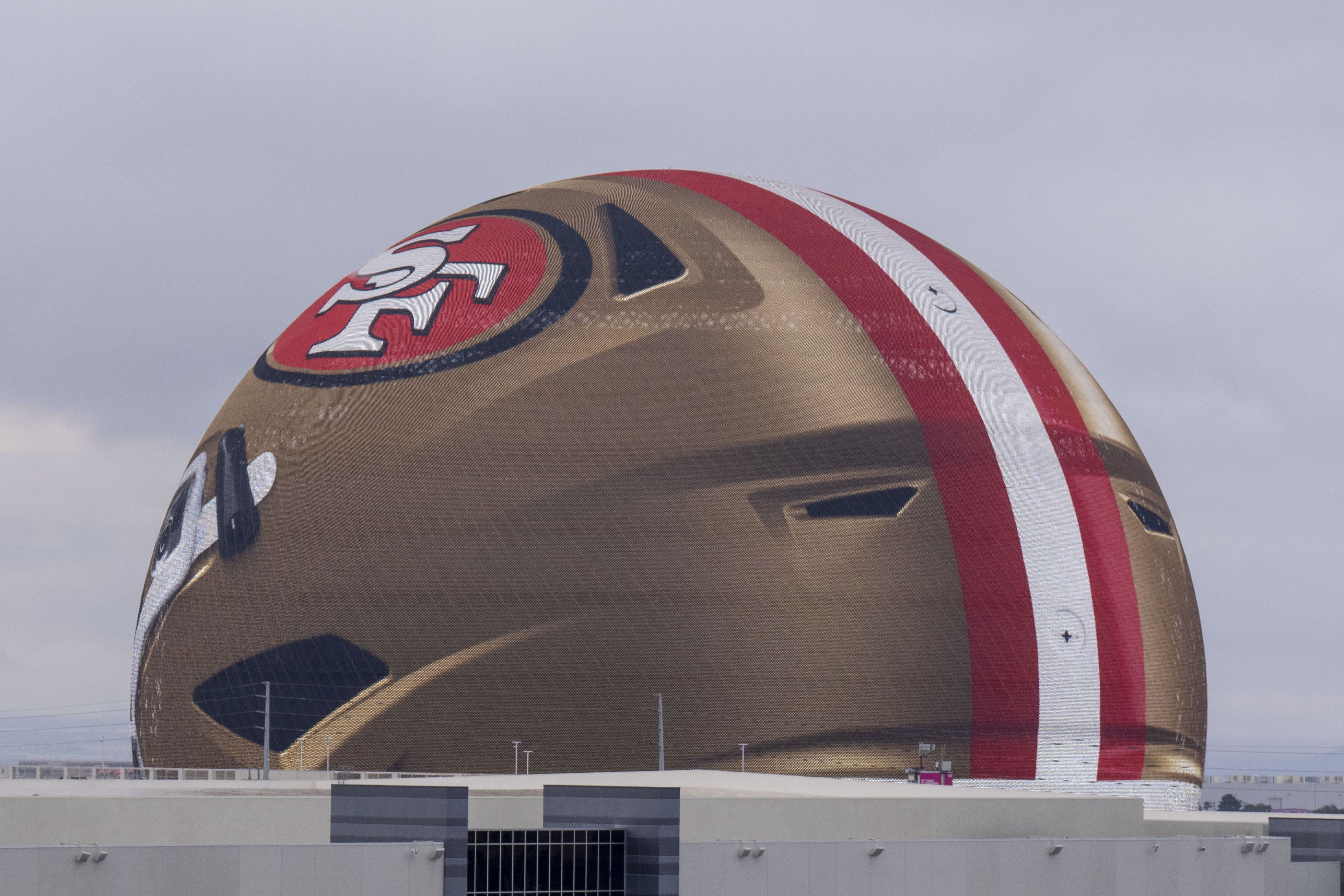  San Francisco 49ers football helmet is displayed on Super Bowl LVIII signage on The Sphere. 