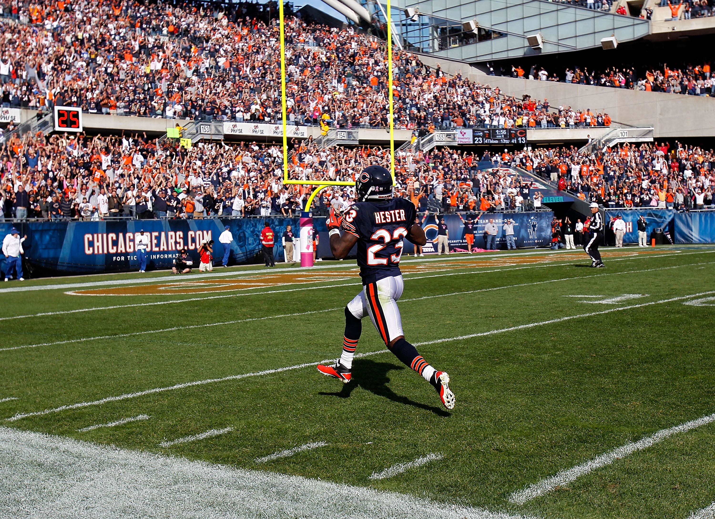 Photo of a football player scoring a touchdown