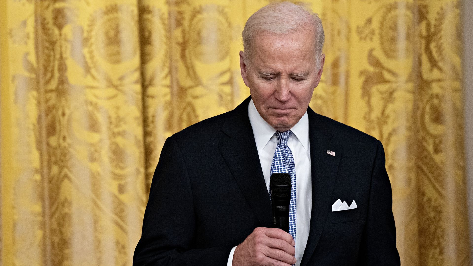 US President Joe Biden listens to a question during an event with a bipartisan group of mayors 