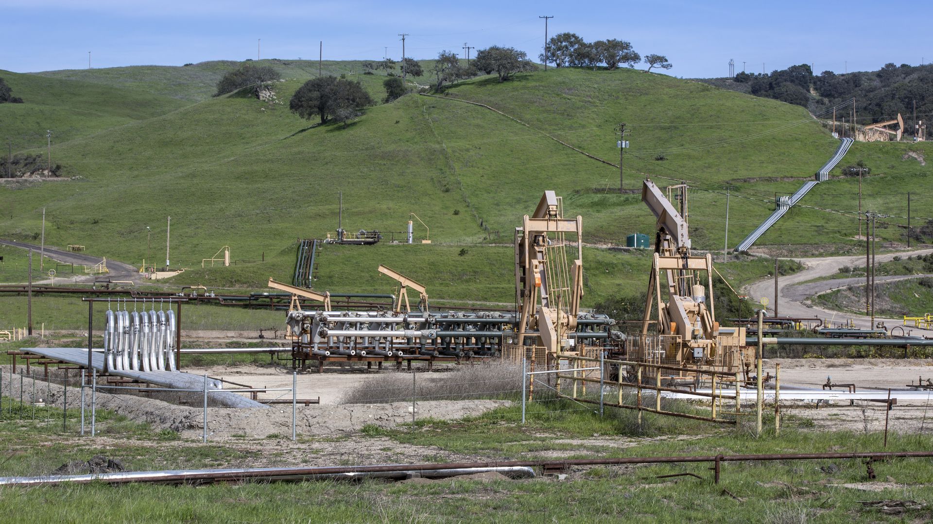 il pipelines and drilling equipment at an ERG facility are tucked into the hills east of Santa Maria as viewed on April 6, 2018.