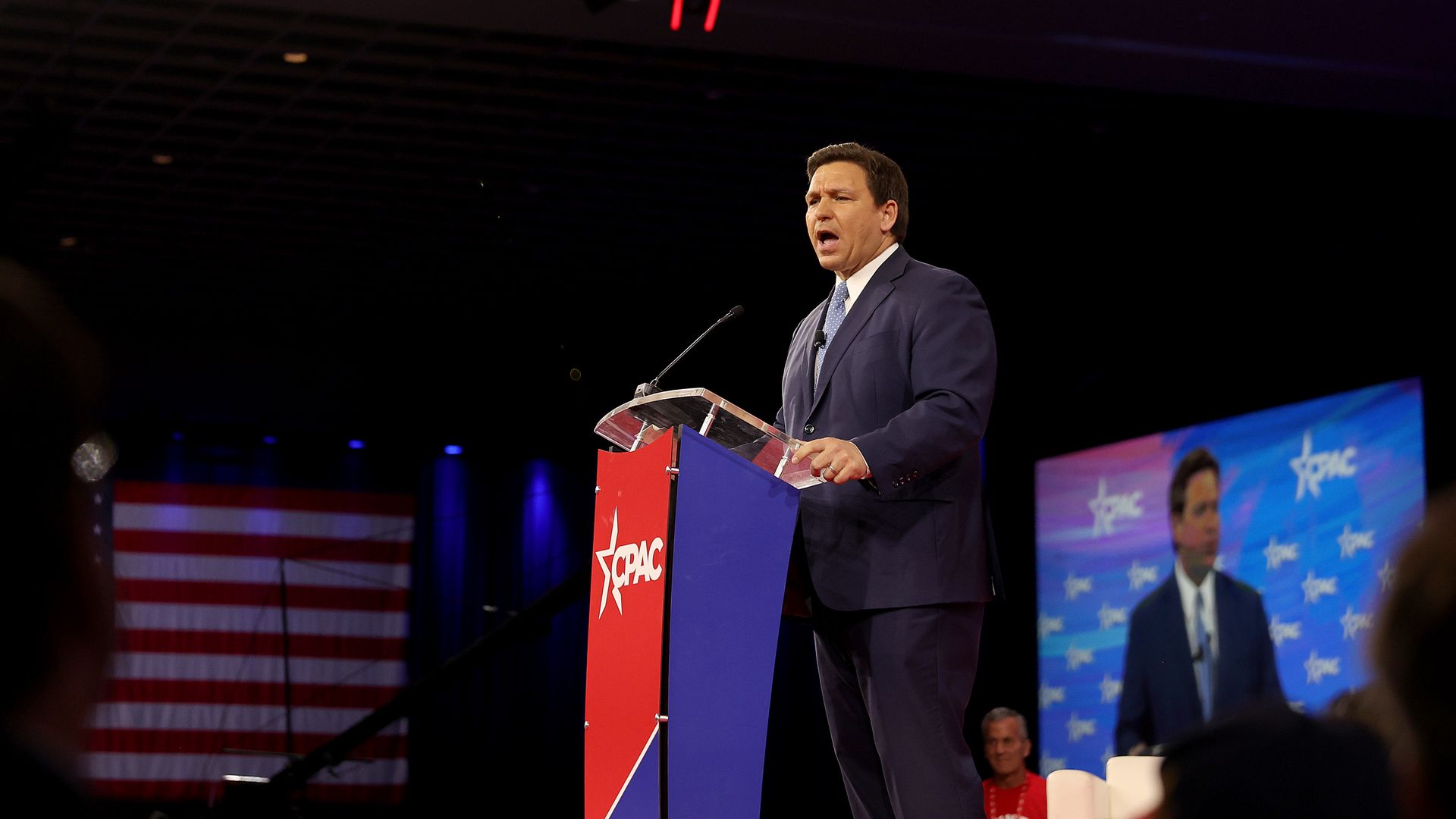 Photo of Ron DeSantis speaking from a podium