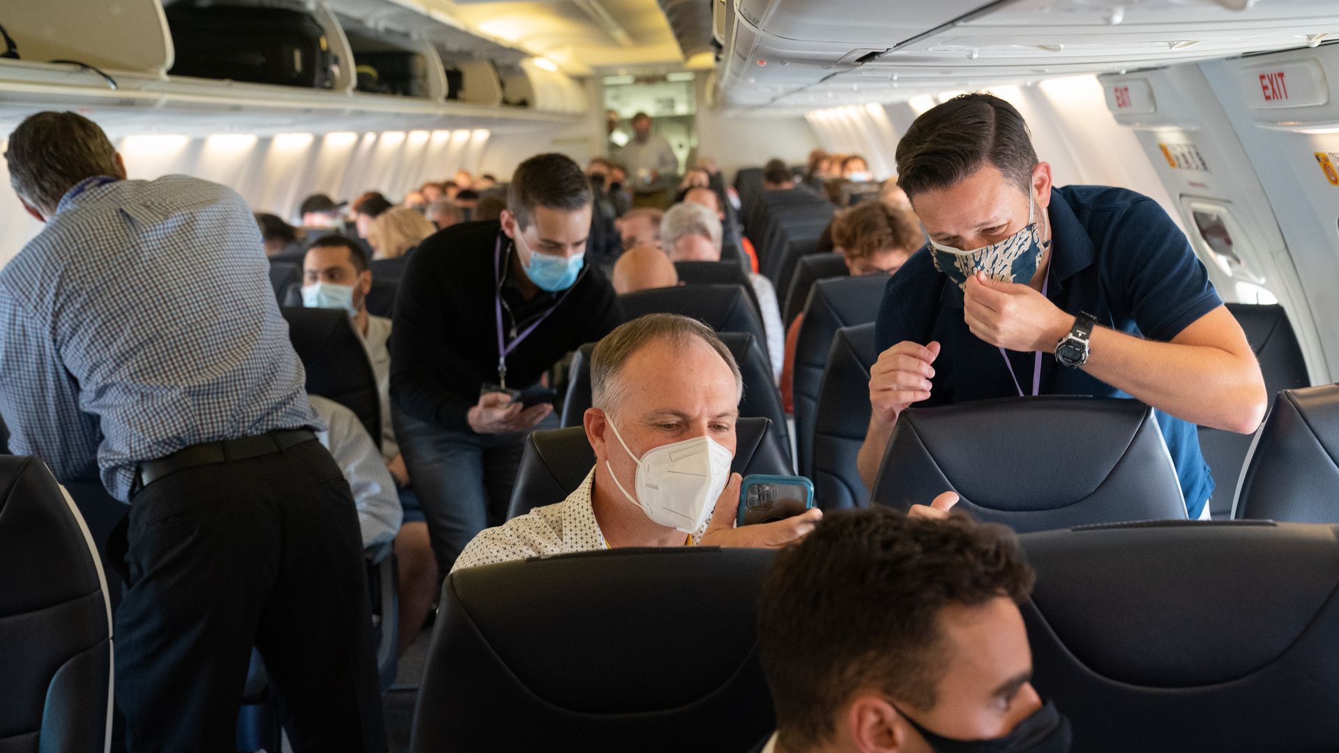 Passengers wearing protective masks onboard a Boeing Co. 737-800 operated by Avelo Airlines ahead of the airline's inaugural flight at Hollywood Burbank Airport (BUR) in Burbank, California