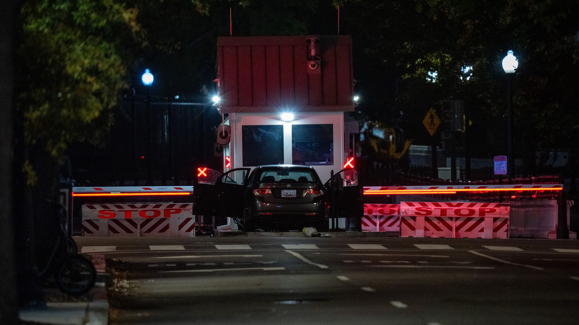 A vehicle is seen after ramming a security barricade at the White House complex in Washington, D.C., on Tuesday night. 