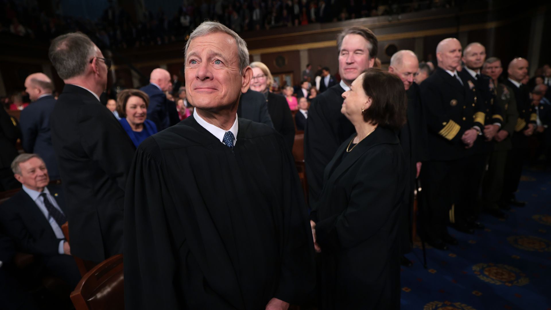 Chief Justice John Roberts looks on during Trump's address to Congress.