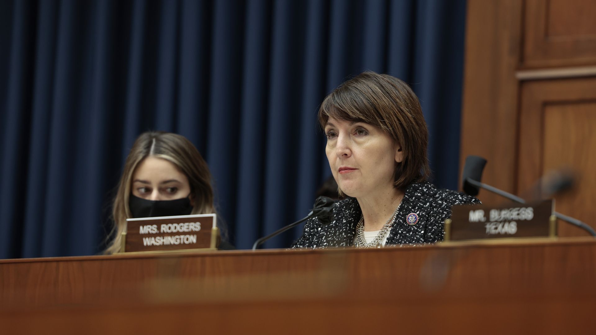 Cathy McMorris Rodgers sits and listens at a committee hearing