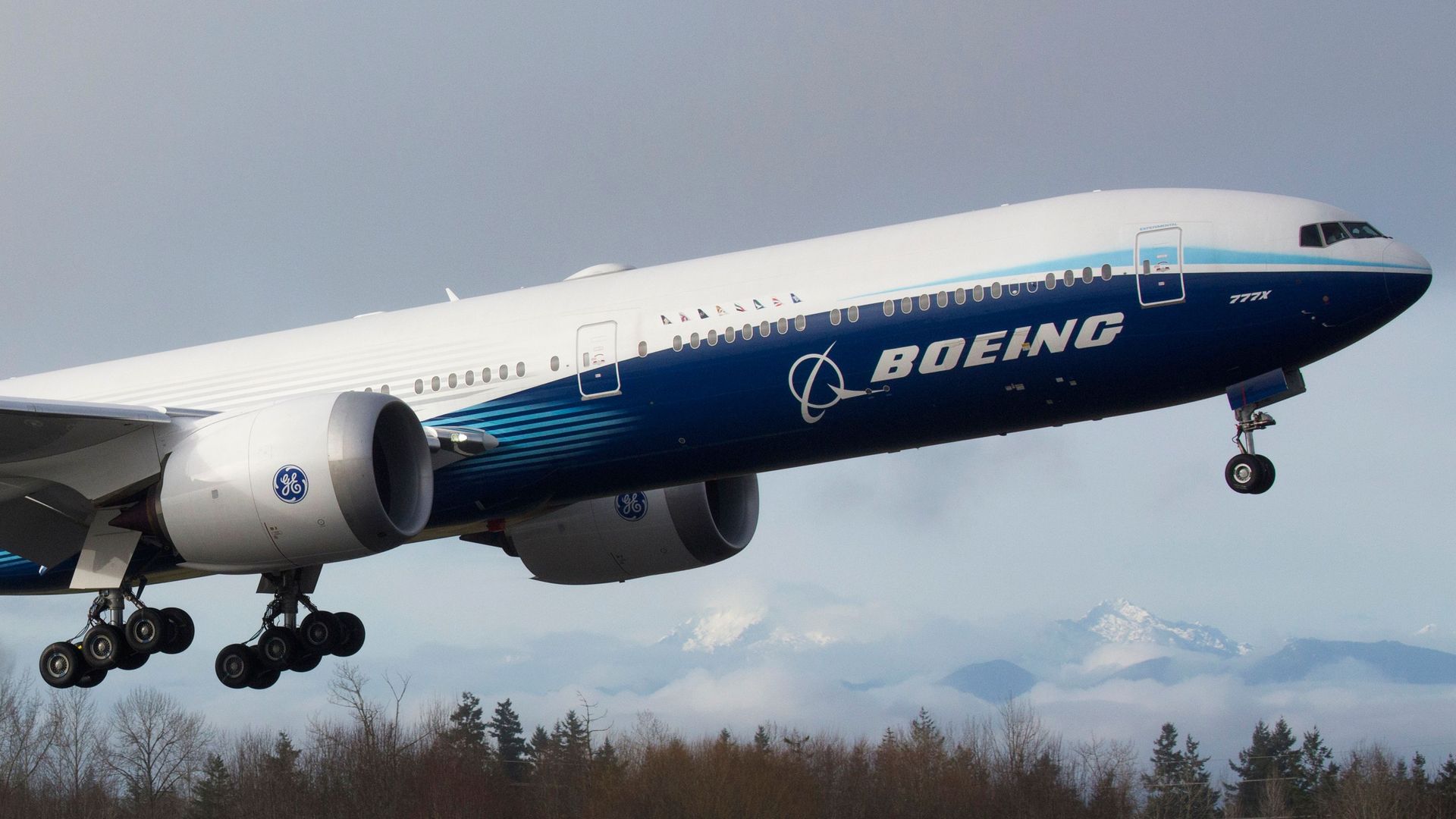A Boeing 777X airplane taking off