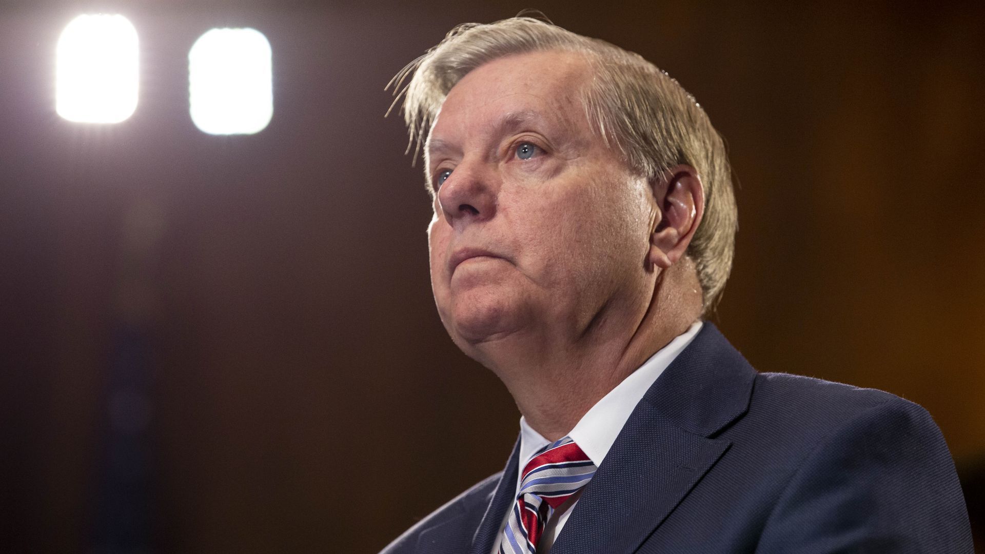 Lindsey Graham's challenger accuses him of "comical" hypocrisy for supporting Trump - Axios