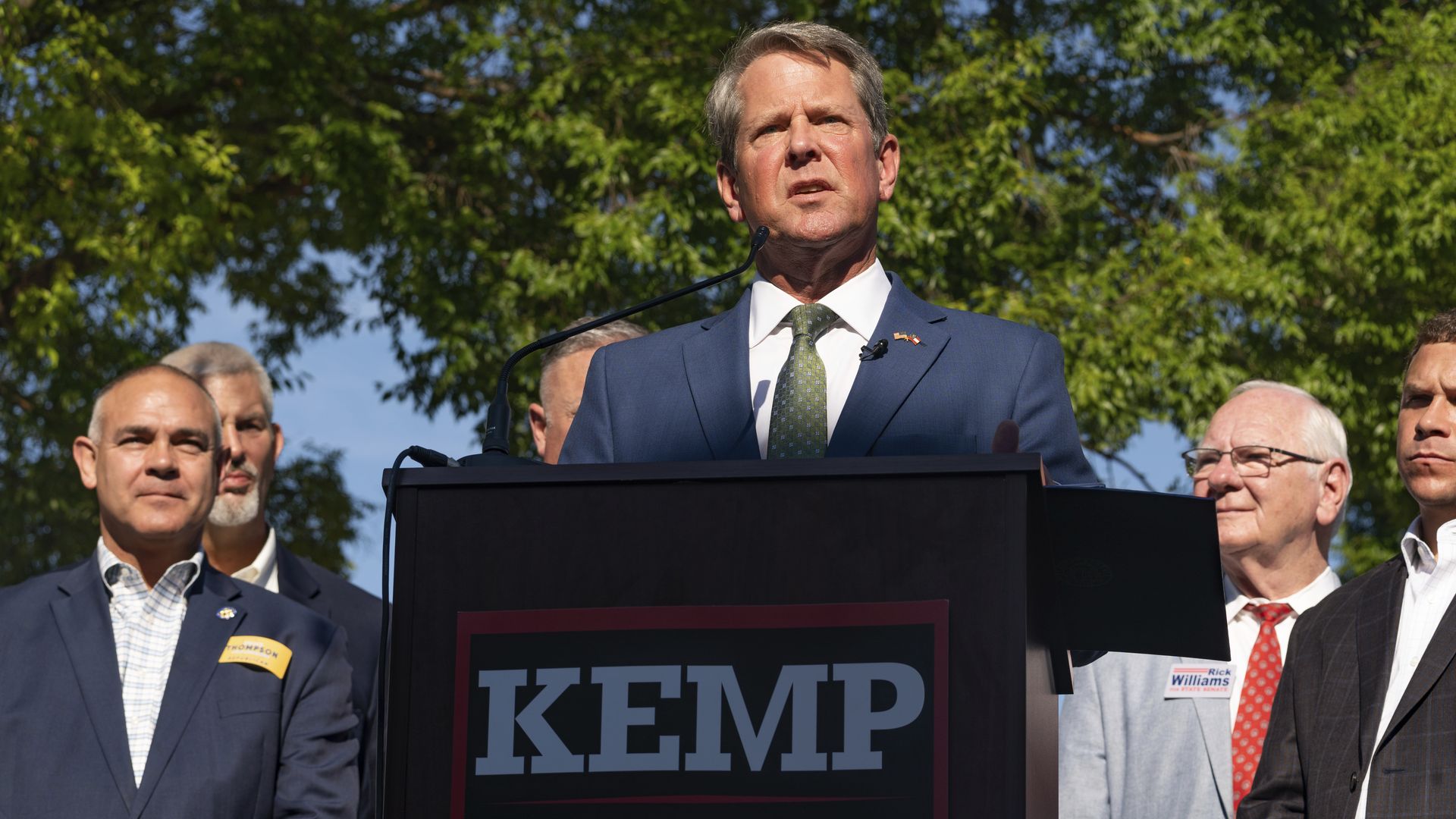 Brian Kemp at a podium