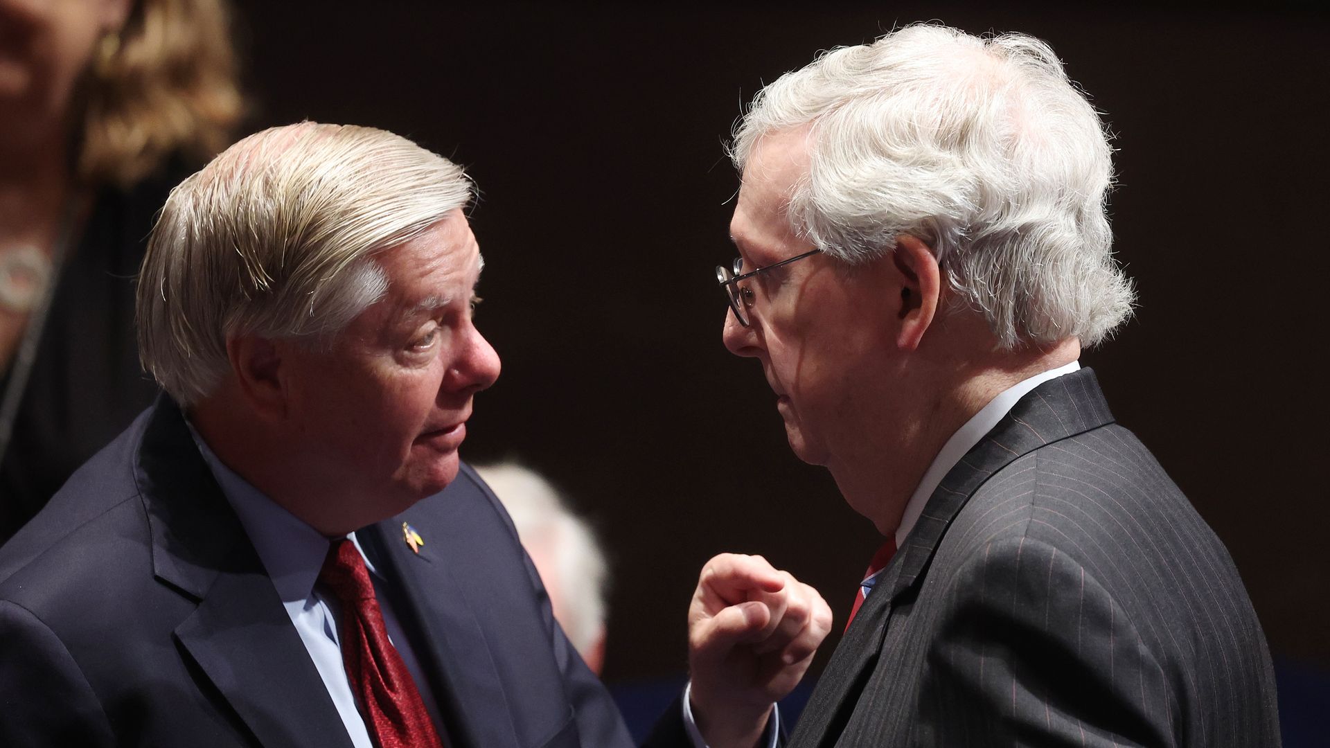 Sens. Lindsey Graham and Mitch McConnell have a conversation.
