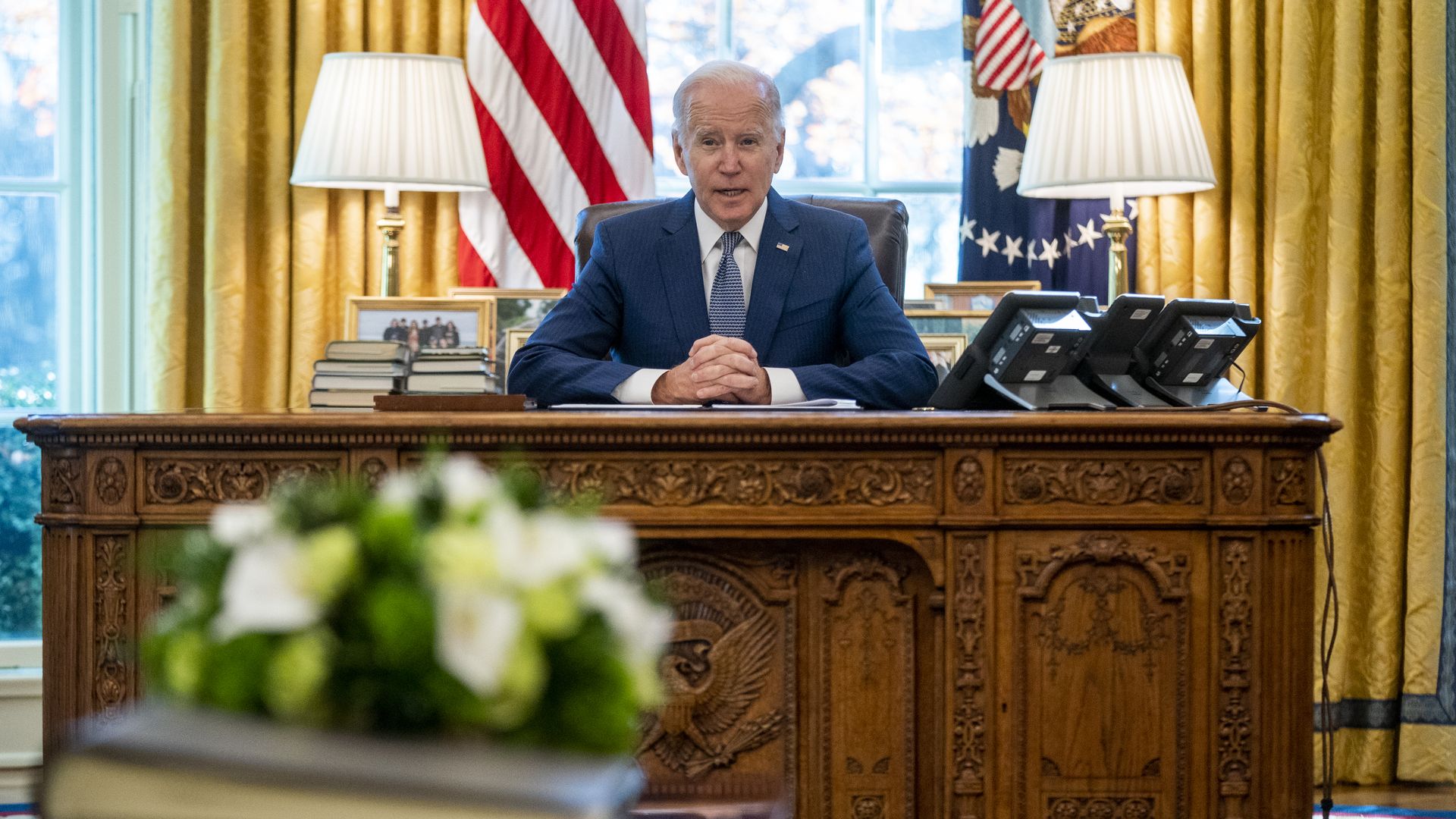 President Joe Biden speaks before signing an executive order on delivering government services in the Oval Office of the White House in Washington, D.C., U.S., on Monday, Dec. 13, 2021.